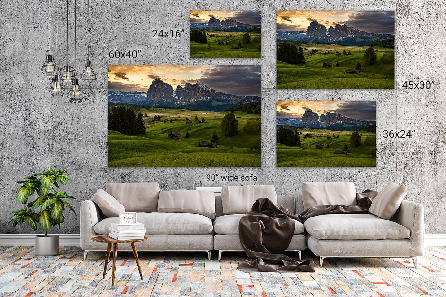 Wall art mockup showing multiple fine art print sizes above a sofa, including 24x16, 36x24, 45x30, and 60x40 inch examples of a mountain landscape photograph.