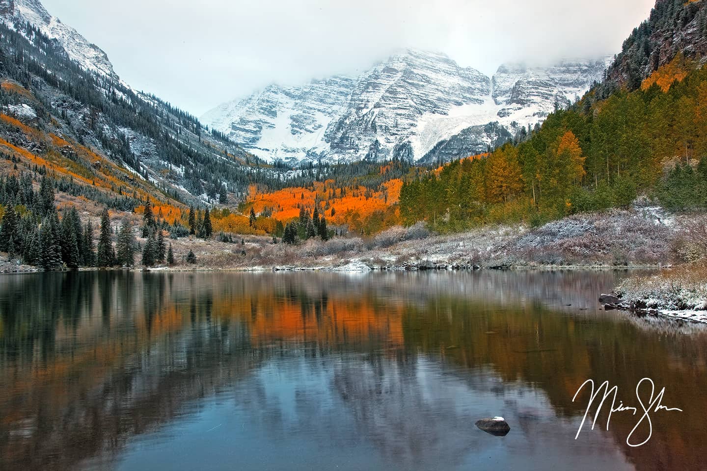 Open edition fine art print of Autumn and Winter Collide at the Maroon Bells from Mickey Shannon Photography. Location: Maroon Lake, Maroon Bells, Aspen, Colorado