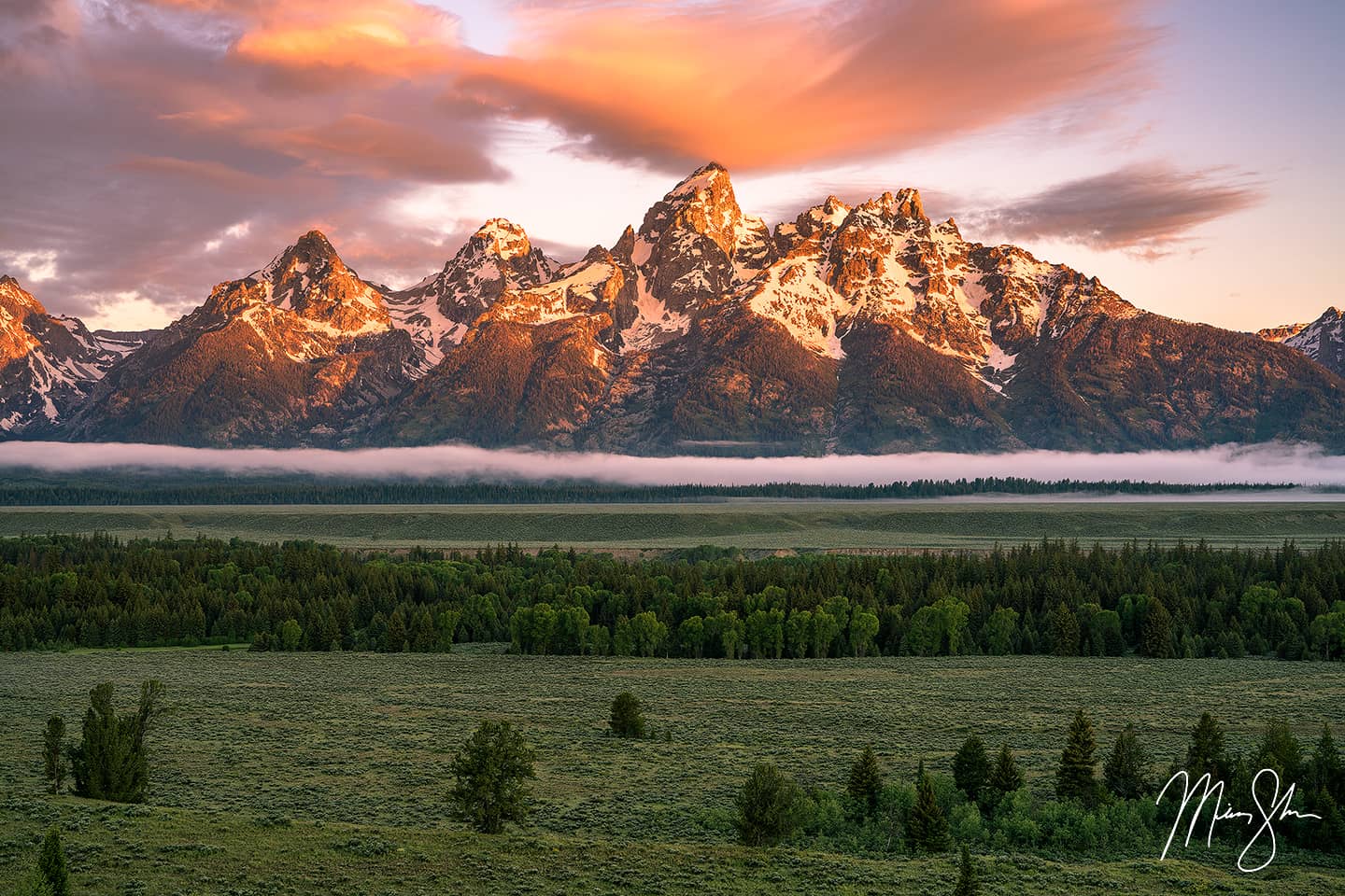 Sunrise at Grand Teton National Park is always an awesome experience. But when everything comes together like this, those famous peaks produce something special! I spent all night shooting night photography, then waited for sunrise. This epic scene was worth the lack of sleep for sure! When the sky lights up like this, along with vivid warm alpineglow and low hanging clouds in the valley below, you know you have something special! I spent some time photographing around the park after this, as the light was great for hours, including running into the famous Grizzy 399 and her four cubs down the road from here! An epic morning for sure!