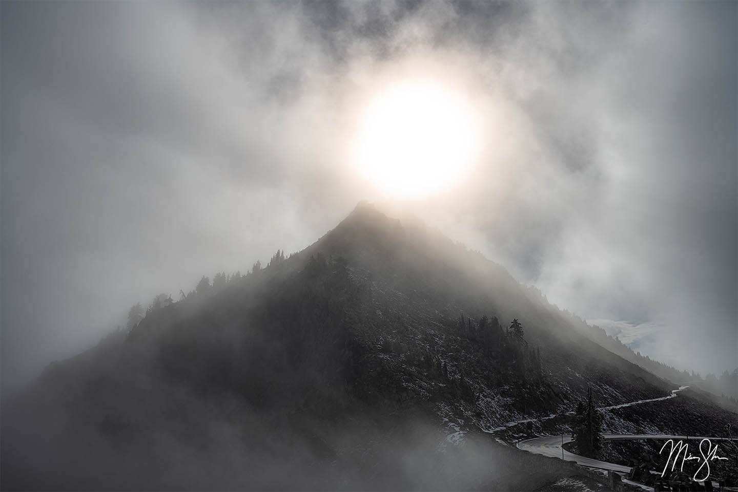 The Ethereal Watchman at Crater Lake National Park shrouded in fog and mist.