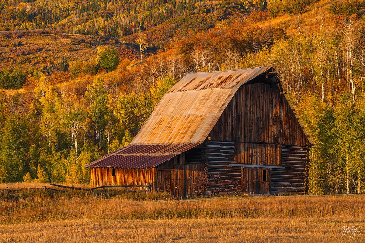 Featured: Barn of Heritage Fine Art Print | Sunset light casts a warm glow on the Heritage Barn near Steamboat Springs, Colorado.